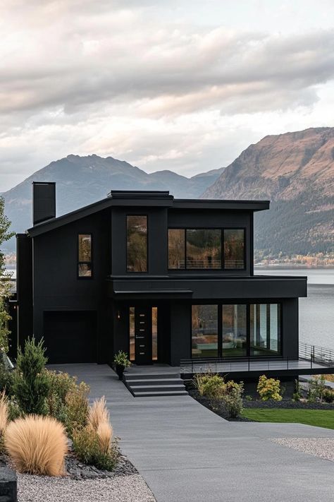 40 All Black Houses That Wow All Neighbors Modern Home Two Story, Modern House Exterior Materials, Black House With Black Windows, Norway House Modern, Blacked Out House, Modern House In The Mountains, Modern House In Mountains, Black Colonial House, Black Matte House