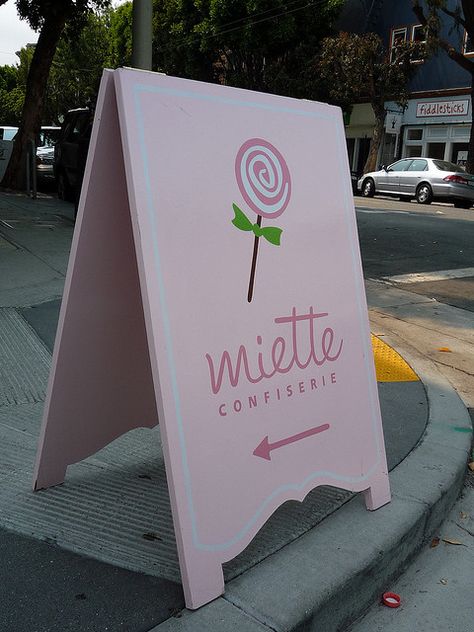 Miette Confiserie sandwich board by daemonsquire, via Flickr Sandwich Board Signs, Baby Makeup, Small Cupcakes, Poster Graphics, Shop Work Bench, Gold Leafing, Sign Board Design, Frame Sign, Sandwich Board