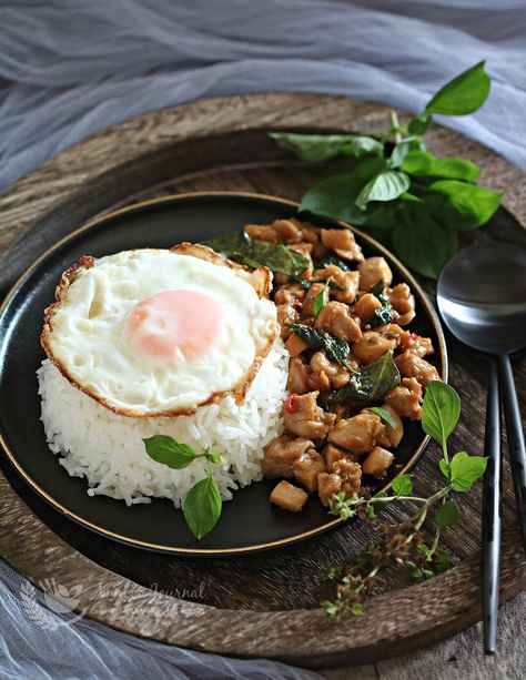 Thai Basil Chicken (Pad Kra Pao in Thai) is a popular and delicious dish served with white rice and top with a fried egg can be done within 15 minutes at home Rice Plating, Pad Kra Pao, Chicken Basil, Thai Food Menu, Food Europe, Thai Basil Chicken, Outdoor Sitting, Chicken Plating, Comidas Fitness