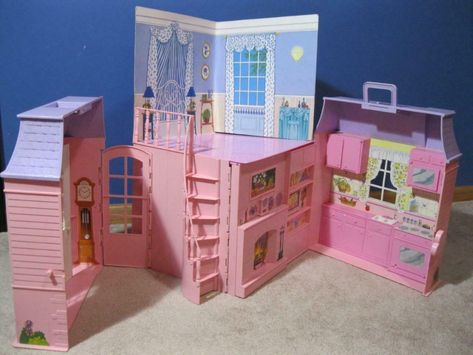 1997 VINTAGE LARGE MERITUS 1990s BARBIE doll Dream HOUSE Folding Fold-Up 2 floor - $74.99. FOR SALE! 1997 Vintage LARGE MERITUS 1990s BARBIE doll Dream HOUSE Folding Fold-Up 2 floor Click images to enlarge Description Marked 1997 MERITUS on bottom. This house is rare and has lots of playroom, including a kitchen with appliances, living room with fireplace, bedroom and a gorgeous stair case. You can make 392956071874 Foldable Dollhouse, Dolls 2000s, Barbie Bakery, 1990s Barbie Dolls, Kitchen With Appliances, 1990s Barbie, Fireplace Bedroom, Barbie Houses, Room With Fireplace