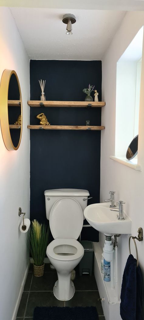 Navy downstairs toilet with gold accessories. Teal Toilet Room, Toilet Accent Wall, Accent Wall Behind Toilet, Sw Cascades, Small Wc Ideas Downstairs Loo, Wall Behind Toilet, Bathroom Wallpaper Accent Wall, Teal Accent Wall, Toilet Wallpaper