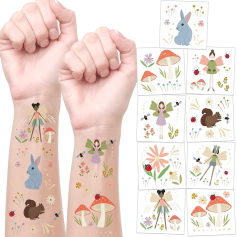 PRICES MAY VARY. Whimsical Pastel Woodland Fairy Design: Each tattoo sheet features a magical Woodland Fairy and animal theme with adorable temporary tattoos; Designs include rabbits, mushrooms, four beautiful fairies, and squirrels, creating an enchanting atmosphere for girls' birthday parties and imaginative play Convenient Packaging: Our set includes 12 sheets of tattoos, with each sheet containing 9 tattoos; totally 108 pieces, Each tattoo measures 2 inches by 2 inches, and the entire sheet Forest Decorations, Removable Tattoos, Enchanted Forest Birthday Party, Woodland Party Decorations, Enchanted Forest Birthday, Woodland Animals Party, Animal Party Decorations, Woodland Fairy Party, Forest Birthday Party