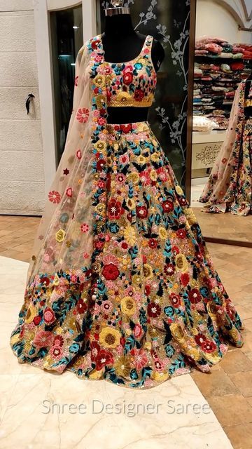 Shree Designer Saree on Instagram: "The Almira Lehenga !! 🤩🌸 Grab This Beautiful Floral Lehenga Fabricated In Soft Net With Applique Work & Touch Of Sequins All Over | Paired With Matching Blouse & Dupatta | Shop Now 💫 Call / Whatsapp : +91 9167456146 / 9819946694 ( Worldwide Inquires ) Email : care@shreedesignersaree.com Ask For Real Images Of Our Work Done In Past For Clients & Get An Idea Of Quality & Fabrics. #indianfashion #embroidery #fashion #fashionista #style #weddings #indianwear #e Party Lehenga With Floral Embroidery, Semi-stitched, Spring Multicolor Floral Embroidery Lehenga, Elegant Multicolor Floral Embroidered Lehenga, Luxury Multicolor Floral Embroidered Lehenga, Luxury Floral Print Lehenga, Floral Lehenga, Vogue India, Dress Indian Style, Groom Wear