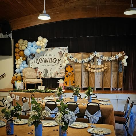 A Little Cowboy is on the Way!
Baby Shower at Old Davie School.  
#ODSHM
#babyshower
#DIY
#thepriceisright
#itsaboy Cowboy On The Way, Cream Balloons, Cowboy Baby Shower Theme, Cow Baby Shower Theme, Baby Boy Cowboy, Baby Shower Balloon Arch, Cow Baby Showers, Cowboy Baby Shower, Western Baby