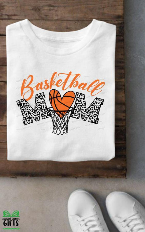 What better way to show support for your child's basketball team than by proudly letting everyone know you're a Basketball Mom! Shirt will come as shown unless noted otherwise. ... daha fazla Basketball Support Shirts, Diy Basketball Shirts Ideas, Basketball Cricut Shirts, Mom Basketball Shirt Ideas, Sports Mom Shirt, Basketball Shirts For Moms, Basketball Mom Shirt Ideas, Basketball Swag, Team Mom Shirt