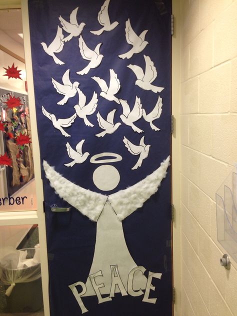 My classroom door decoration this year. Sweet and simple...had the kids each write someone they love on their doves. Angel Door, 2024 Classroom, Classroom Door Displays, Christmas Doors, Holiday Door Decorations, Christmas Door Decorating Contest, Christmas Classroom Door, School Door Decorations, Hope Christmas