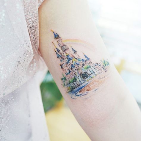 Tattoo uploaded by Tattoodo | Tattoo by Banul #Banul #landscapetattoos #color #watercolor #fineline #linework #painting #Disney #castle #rainbow #fairytale | 593371 | Tattoodo Floral Watercolor Tattoo, Small Watercolor Tattoo, Paris Tattoo, Castle Tattoo, Tattoos For Women Half Sleeve, Harry Potter Tattoos, Disney Tattoo, Tattoo Kits, Hot Tattoos