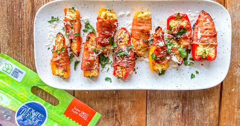 This is a great appetizer idea: prosciutto wrapped Pure Flavor® Aurora Bites Mini Sweet Peppers that have been stuffed with ricotta and mozzarella. These are a twist on a typical jalapeno popper and super easy to make. Pioneer Woman Sweet Pepper Poppers, Sweet Pepper Poppers, Mango Chutney Chicken, Kale Chicken Salad, Chutney Chicken, Pepper Poppers, Sausage Appetizers, Roasted Red Pepper Dip, Prosciutto Wrapped