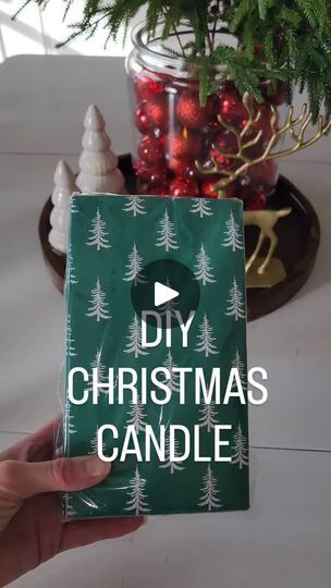 3.4K views · 2K reactions | DIY CHRISTMAS CANDLE 🎄  Follow and comment SANTA for details to send to your inbox   I made fall napkin candles recently, and I thought they were so cute... So I wanted to make some for Christmas!  I used a christmas tree napkin print I found on amazon!   Directions: Separate your napkin, place it directly on the candle and wrap in parchment paper then iron it! It's a super easy Christmas craft, and there are endless options.  You can use a flameless candle so that you can use it all year round!  ✨️Always use caution when burning candles. Never leave unattended • #christmasdecoratingideas #christmasflorals #christmasaesthetic #diychristmasdecor #pumpkindecor #floralarrangement #diychristmasdecor  • Christmas crafts| christmas candle| cozy home decorating |affor Napkin Candles, Gift Wrapping Candles, Candle Decorating, Cheap Presents, Christmas Tree Napkin, Candle Cozy, Candles Homemade, Christmas Luncheon, Tree Napkin