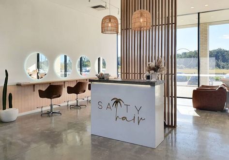 Hair Salon Concrete Floor, California Salon Aesthetic, Salon With Concrete Floor, Salon Concrete Floor, Open Concept Salon Ideas, Open Floor Plan Hair Salon, Concrete Salon Floor, Minimalist Salon Interior Design, Corner Retail Display