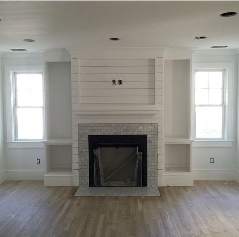 Fake Fireplace Built In, Slim Fireplace Built Ins, Fireplace With Narrow Built Ins On Both Sides, Fireplace With Small Built Ins, Fireplace Built Ins Small Space, Built Ins Not Wall To Wall, Fireplace Tv Wall Between Windows, Fireplace With Storage On Sides, Fireplace With Built Ins And Windows