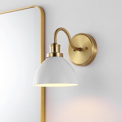 Industrial sleek meets celebrity chic in this fabulous wall sconce. Attleborough's decidedly utilitarian white shade is given a glamorous twist with its gold-finished base, making Attleborough a must-have in today's eclectic interiors. Birch Lane™ | Birch Lane™ Attleborough Wall Sconce 10.5 H x 8.0 W x 12.25 D in brown / white / yellowGlass / Metal in Gold / White | 10.5" H X 8" W X 12" D | Wayfair Kitchen Sconces Over Sink, Over Sink Lighting Kitchen, Over Sink Lighting, Kitchen Sconces, Kitchen Sink Lighting, Floor Renovation, Over Sink, Eclectic Interior, Birch Lane