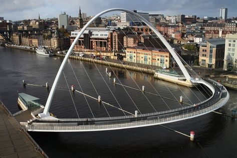 Gateshead Millennium Bridge: World’s Only Tilting Bridge Gateshead Millennium Bridge, Newcastle Gateshead, Millennium Bridge, Tilt Shift, Pedestrian Bridge, Bridge Design, Chemical Engineering, Seaside Resort, Newcastle Upon Tyne