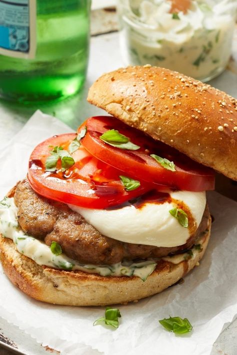 If you're a fan of caprese salads, you'll love this healthy turkey burger recipe. The patties are seasoned with Italian spices, then topped with juicy tomatoes drizzled with balsamic, fresh basil and fresh mozzarella. #summer #summerrecipes #healthysummerrecipes #summerproduce #summerproducerecipes #recipe #eatingwell #healthy Italian Turkey Burger, Italian Burger, Turkey Burger Recipe, Dr Gundry, Italian Turkey, Turkey Burger Recipes, Italian Spices, Healthy Turkey, Turkey Dishes