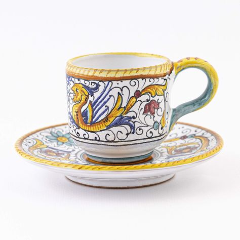 PRICES MAY VARY. Our espresso coffee cup & saucer is entirely handmade and hand-painted in Deruta, Italy. Its maker is Fima, a well-known artisan who specializes in classic Italian pottery designs. The artisan’s signature is hand-painted on the bottom of each piece. The pattern hand-painted on this small cup and its saucer is Raffaellesco, possibly the most popular Deruta ceramics design. It is named after Raphael, the Italian painter who introduced these decorations in many of his frescoes. Esp Espresso Cups Ceramic, Italy Coffee, Italian Espresso, Best Espresso, Espresso Cups Set, Painted Cups, Italian Pottery, Italian Coffee, Italian Ceramics