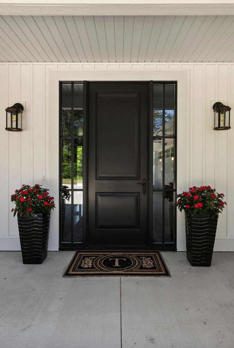 Chic English farmhouse in Michigan flooded with natural light Modern Farmhouse Entrance Door, Modern Farmhouse Black Exterior Door, Inside Front Door Black, Black Glass Entry Door, Black Back Yard Door, Black Fromt Door, Front Foor, Black And White Modern Farmhouse, English Door