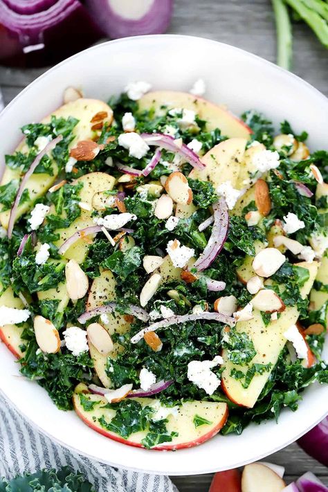 This Kale Salad with Apples and Goat Cheese is massaged with a sweet and tangy maple vinaigrette to soften the kale and remove all bitterness- this recipe will turn anyone into a kale lover! Kale Goat Cheese Salad, Kale Salad With Apples, Salad Apple, Cheese Salad Recipes, Massaged Kale Salad, Salad With Apples, Maple Vinaigrette, Massaged Kale, Kale Salad Recipes