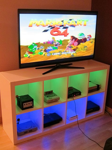 I modified an Ikea bookshelf to make a console cabinet. Very happy with the finished product! - Imgur Unique Man Cave Ideas, Video Game Storage, Mancave Garage, Diy Projects For Bedroom, Ikea Bookshelves, Man Cave Basement, Game Storage, Video Game Rooms, Diy For Men