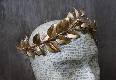 Cassandra. Crowns base will be recognizable gold leaves Gold Leaf Crown Greek, Greek Headpiece, Greek God Costume, Leaf Tiara, Gold Leaf Crown, Toga Costume, Elegant Crown, Toga Party, Female Pirate Costume