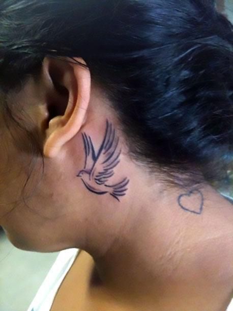 A small tattoo of a dove inked behind the ear. Style: Tribal. Color: Black. Tags: Easy Dove Neck Tattoo, Behind The Ear Tattoos, Tattoo 2015, Behind The Ear Tattoo, Behind Ear Tattoos, Dove Tattoos, Black Bird Tattoo, Dove Tattoo, Ear Tattoos