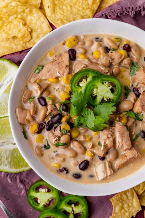 a bowl of white chicken chili with jalapenos and cilantro Best Slow Cooker Chili, Slow Cooker White Chicken Chili, Low Carb Holiday Recipes, White Chicken Chili Slow Cooker, Boiled Chicken Breast, Chili Toppings, Chicken Chili Recipe, Slow Cooker Chili, Best Slow Cooker