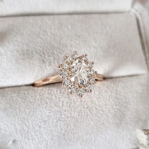 Aardvark Jewellery on Instagram: "Our new antique inspired model, featuring a central oval cut moissanite, with a halo of lab grown diamonds, in 18ct rose gold! #labgrown #labgrowndiamonds #moissanite #engagementring #engagementringdesign #engagmentrings #antique #antiqueinspired #jewelry #jewellery #jewelryaddict #jewelrygram #instajewelry #instajewellery #aardvarkjewellery" Antique Gold Oval Cluster Ring, Antique Oval Cluster Ring With Halo Setting, Heirloom Oval Halo Jewelry, Heirloom Oval Cluster Ring With Halo, Heirloom Oval Halo Cluster Ring, Aardvark Jewellery, Diamond Cluster Engagement Ring, Colored Engagement Rings, Unique Diamond Engagement Rings