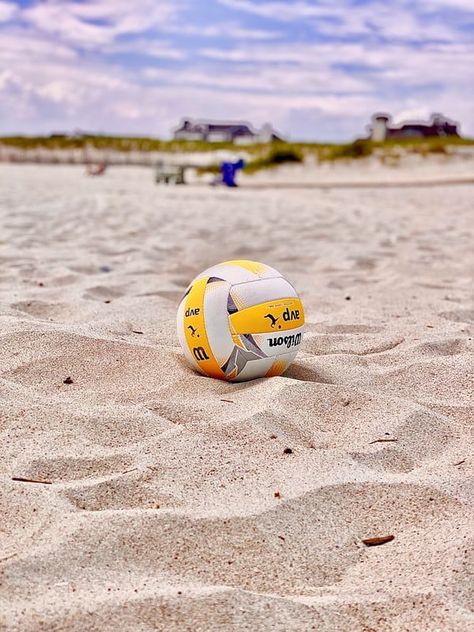 Beach #volleyball is a team sport played by two teams of two players on a sand court divided by a net. Similar to indoor volleyball, the objective of the game is to send the ball over the net and to ground it on the opponent's side of the court. Volleyball Background, Volleyball Aesthetic, Volleyball Wallpaper, Volley Ball, Beach Volleyball, Volleyball, For Free, Wallpapers