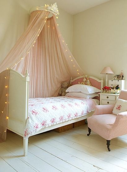 Girl bedroom decor with a soft tulle canopy and twinkle lights.  #kids #bedroom #decor #interior #kidsbedroom #baby Fairy Bedroom, Magical Furniture, Princess Bedroom, Fairy Lights Bedroom, Princess Room, Shabby Chic Bedrooms, Versace Home, Canopy Bed