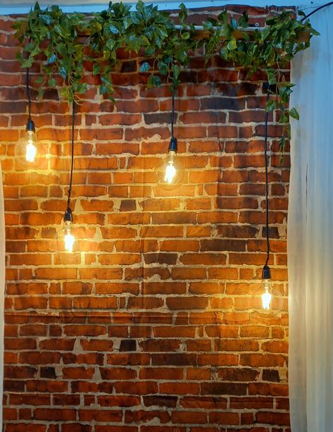 How To Decorate A Brick Wall, Cafe Accent Wall, Brick Cafe Interior, Decorate Brick Wall, Brick Wall Cafe, Fairy Lights On Wall, Brick Cafe, Brick Wall Decor, Garden Center Displays