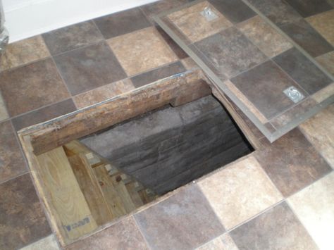 Secret trap door to crawlspace - With a little forethought and some extra work on new construction, you can make the tile match the cutout of your trap door, and make it much less conspicuous. Store Veggies, Crawl Space Door, Hidden Passageways, Space Door, Secret Passage, Secret Hiding Places, Secret Passages, Hidden Spaces, Trap Door