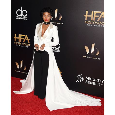 Janelle Monae made a dramatic entrance donning a white tuxedo jacket, which featured a stunning train, to the 20th Annual Hollywood Film Awards. Tuxedo Long Dress, Tux For Women, Womens Tuxedo Dress, Prom Suit And Dress, Male Bride, Fem Fashion, Prom 2025, Dramatic Entrance, Black And White Suit