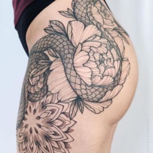 60+ Classy Side Thigh Tattoos: Insights, Meanings & Best Designs — InkMatch Cool Thigh Tattoo For Women, High Thigh Tattoo, Thigh Tattoo Men, Side Thigh Tattoos, Garter Tattoo, Tattoos For Men And Women, Full Sleeves Design, Hip Thigh Tattoos, Thigh Tattoo Designs