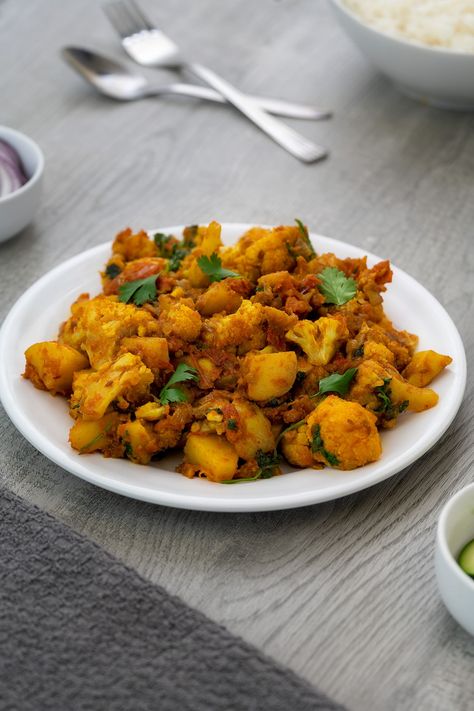 Aloo Gobi Recipe Alu Gobi, Cauliflower Fry, Gobhi Recipe, Aloo Gobi Recipe, Gobi Masala, Potato Cauliflower Curry, Gobi Recipe, Gobi Recipes, One Pot Vegetarian