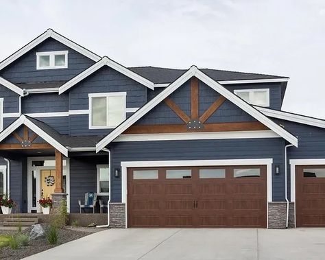 Slate Blue House Exterior With Cedar, Dark Blue House Exterior Black Windows, Navy House Black Door, Dark Exterior With Cedar Accents, Navy Craftsman Exterior, Smokey Blue House Exterior, Blue House Wood Garage Door, Navy Blue House Exterior With Cedar, Blue Siding House With Stone