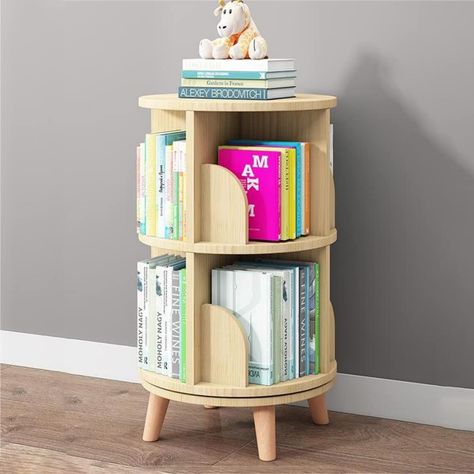 PRICES MAY VARY. 💖【360° Rotating】- This small book shelf has a unique 360° rotating design. This bookcase not only attracts kids to enjoy the fun of storage, but also displaying books, toys, CDs, handicrafts. 💖【Solid Wood】- Our kids bookshelf is made of Thickened Pine Wood. The surface can be painted to your favorite color. It is sturdy and stable and not easy to break. It needs some slight sanding, and sand paper is supplied. 💖【Space Saving】- Diam: 18 inch. The rotating bookcase occupies ver Small Space Book Storage, Spinning Bookshelf, Book Display Shelves, Round Bookshelf, Bookshelf Wood, Rotating Bookshelf, Book Display Shelf, Kids Book Storage, Storage For Living Room