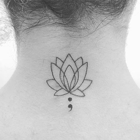 40 Beautiful Semicolon Tattoo Designs And Their Meanings: The lotus flower is seen as a symbol of elevating oneself and rising above. This design is a simple outline that looks great inked on the back of your neck. But, you can also rock this tattoo on your back, leg, shoulder, or upper arm. #Tattoo #Lotus #SemiColon #TattooIdeas #TattooDesigns Let a real tattoo artist make the design for your new tattoo! :)I am a tattoo artist and graphic designer with 6 years of experience, I have tattooed Lotus Flower Tattoo Semi Colon, Lotus Flower Tattoo Upper Arm, Small Dragonfly Tattoo Semicolon, Lotus Flower Tattoo With Semi Colon, Lotus Flower And Semicolon Tattoo, Lotus And Semicolon Tattoo, Small Survivor Tattoo, Flower And Semicolon Tattoo, Patch Tattoos