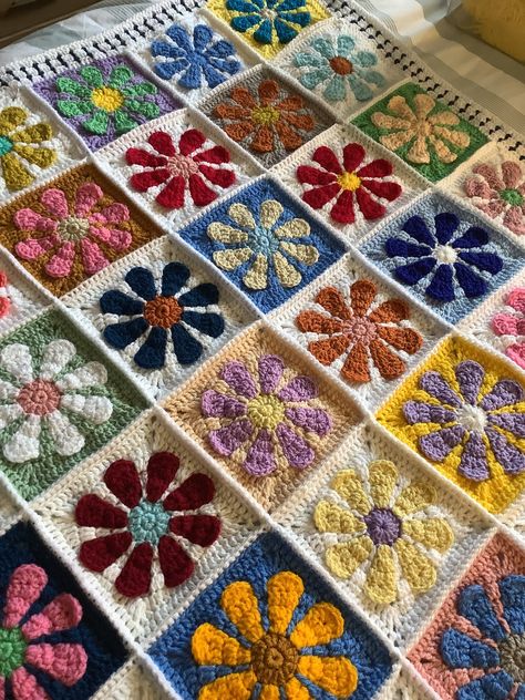 Beautiful soft crochet Retro Daisy lap blanket Crochet Blanket Daisy, Retro Flower Crochet Blanket, Retro Flower Granny Square Blanket, Cool Stuff To Crochet, Retro Daisy Granny Square Blanket, Random Granny Square Blanket, Flower Crochet Blanket Pattern, Retro Flower Granny Square, Crochet Projects Blankets