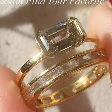 Frank Darling Custom Rings on Instagram: "If you know us, you know we love our emerald diamonds 🥰 Our post-modern emerald Plutch features a sleek barely-there half bezel designed to frame your east west set emerald diamond. Pair it with an east west baguette eternity band, and we’re hooked 😍💎 #emeraldring #emeraldengagementring #emeraldcut #emeraldcutdiamond #ringstack #ringstacking #ringstacks #solitaireengagementring #solitairering #eastwestring #bezel #bezelsetting" Horizontal Emerald Engagement Ring, Frank Darling, Baguette Eternity Band, Half Bezel, Diamond Stacking Rings, Oval Engagement, 2024 Wedding, Wedding Vibes, Post Modern