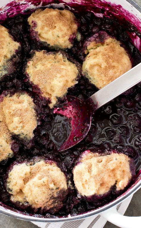 Blueberry Grunt: There are pies, there are crumbles, and then there are grunts. These fruity desserts are topped with light, fluffy dumplings and baked in a large pot or Dutch oven. Blueberry Slump Recipe, Grunt Recipe, Blueberry Grunt Recipe, Canadian Foods, Blueberry Grunt, Zucchini Dishes, Fluffy Dumplings, Canadian Dessert, Cobbler Crust