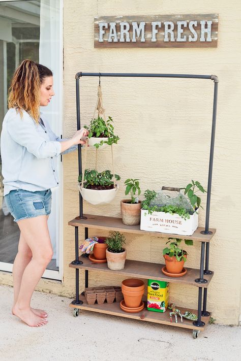 DIY Rolling Garden & Plant Shelf | HOME | Fresh Mommy Blog Diy Plant Shelf, Plant Shelf Ideas, Plant Shelves Outdoor, Kaktus Dan Sukulen, Garden Shelves, Plant Stands Outdoor, Modern Plant Stand, Vertical Herb Garden, Plant Shelf