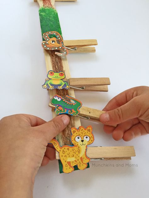 Layers of the Rainforest Craft | Fun Family Crafts Layers Of The Rainforest, Rainforest Preschool, Rainforest Crafts, Rainforest Project, Rainforest Activities, Zoo Preschool, Rainforest Theme, Fine Motor Activity, Rainforest Animals