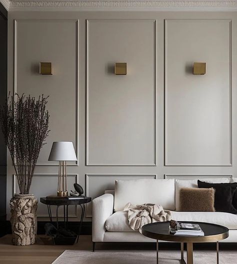 Painted Wall Paneling: The 7 Best Styles For Modern Interiors Wainscoting Angled Ceiling, Molded Wall Panels, Wainscoting Office Wall, Wall With Moulding Design, Two Story Paneled Wall, Wall Between Dining And Living Room, Wall Trim Moulding Dining Room, Box Trim Accent Wall, Wall Moldings In Living Room