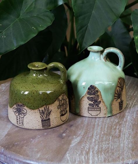 Cheri Downey | Ceramicist on Instagram: "Plant watering bells with mini house plants on them 🪴😫 these 2 are still available for purchase on my website 😊  #ceramics #pottery #potteryasmr #glaze #ceramicglaze #glazelayering #supportsmallbusiness #giftideas #homedecor #wateringbell #handmademug #madeinaskutt #fired #wheelthrown  #brownclay #speckledclay #huntsville #huntsvillealabama #alabama #huntsvilleartist #huntsvilleart #huntsvillesmallbusiness" Pottery Instagram, Plant Watering, Handmade Plates, Slab Pottery, Ceramics Pottery, Mini House, Wheel Thrown, Ceramic Plates, Organic Shapes