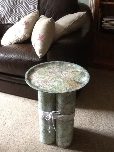 Side table made from cardboard tubes & tray, covered with maps. Cardboard Tubes Repurposed, Cardboard Fireplace, Toilet Paper Art, Pipe Table, Spool Crafts, Cardboard Toys, Interior Design Elements, Repurposed Items, Cardboard Tubes