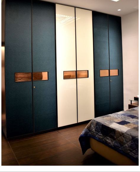 Iron Wardrobe Design, Royal Touch Laminate Wardrobe, Blue Wardrobe Design, Wooden Almirah Design Bedrooms, Wardrobe Laminate Color Combination, Wardrobe Laminate Design Master Bedrooms, Bedroom Cupboard Designs Colour, Wardrobe Color Ideas Bedroom, Sliding Wardrobe Doors Design