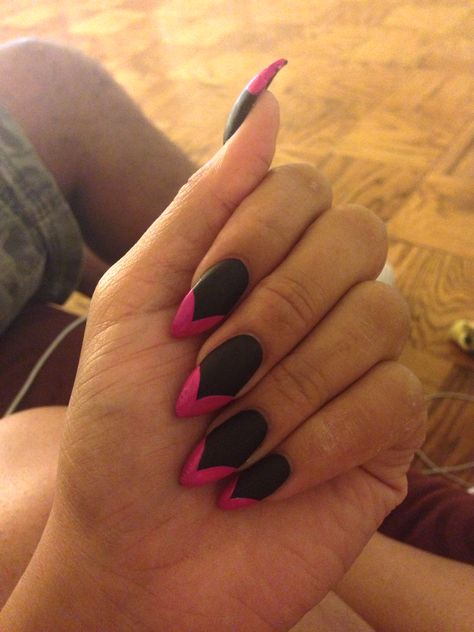 Really cute spin on a French manicure. Matte black polish with pink curtain tips. Black Nails With Pink French Tip, Pink Nail With Black Tip, Pink Black French Tip Nails Short, Black And Pink Almond Nails, Black French Tips With Pink, French Manicure Matte, Black French Tip Nails Pink Base, Pink Nail Black Tip, Coloured French Manicure