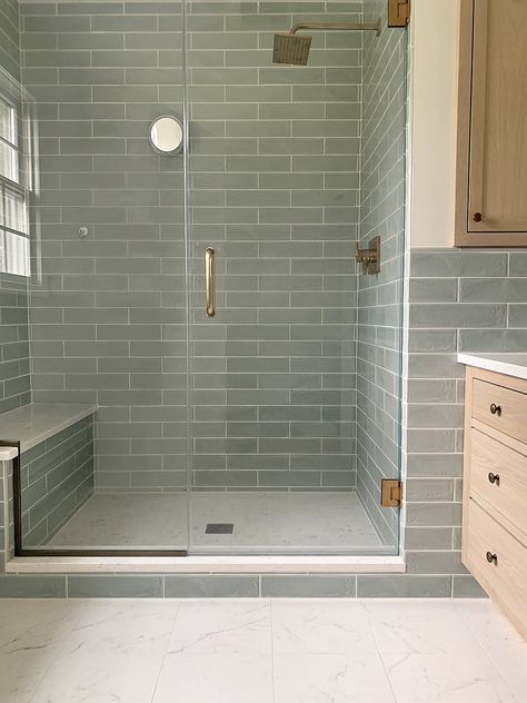 Bathroom Green Subway Tile, Shower With Color Tile, Pale Green Tiles In Bathroom, Olive Shower Tile, Aesthetic Bathroom Floor Tile, Bathroom With Green Tile Walls, Light Green Shower Tile Bathroom, Green Subway Tile Shower Ideas, Bathroom Continuous Tile