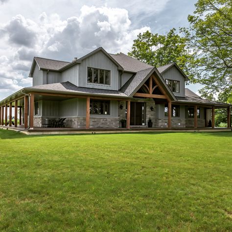 Looking for that perfect wrap around porch? Let us make your dreams come true. #precisionhomeslondon #customehome #accesablebuilds… Modern Farmhouse With Breezeway, House Design Exterior Farmhouse Wraparound Porch, Bardominum Ideas Front Porch, Colorado Exterior House Colors, Two Story Farmhouse Wrap Around Porch, Farm House Wrap Porch, Wrap Around Porch With Garage, Dream Farmhouse Exterior Wrap Around Porch, Gray Exterior Color Schemes Farmhouse