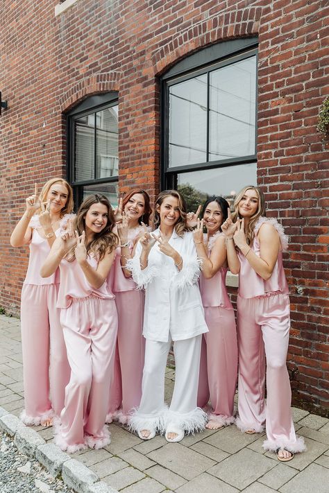 Bride and Bridesmaids in Silk PJs | Capture the joy and excitement of your wedding morning with your besties! These matching satin pajamas and fun vibes make for the perfect getting-ready photos. Book Kathy as your editorial wedding or Newport wedding photographer at simplykstudios.com! Bridesmaids Getting Ready Pajamas, Pajama Wedding Theme, Bride And Bridesmaid Pajamas, Morning Of Wedding Ideas Bridal Parties Outfits, Morning Of Bridesmaids Outfits, Matching Bridesmaid Pajamas, Bridesmaids Matching Pjs, Bridesmaid Pj Pictures, Fall Getting Ready Wedding Outfit