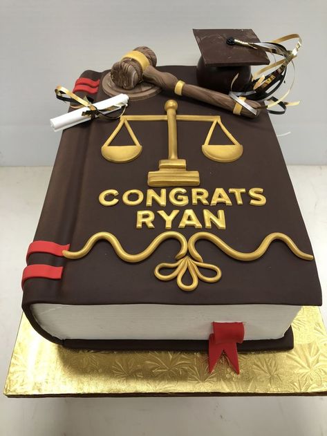 Fondant covered law book with fondant pieces, the justice scale is painted gold and a chocolate graduation cap Law School Graduation Cake Ideas, Law Graduation Cakes, Law School Graduation Cake, Law Cake, Chocolate Graduation, Lawyer Cake, Graduation Cake Designs, Fruits Name In English, Congratulations Cake